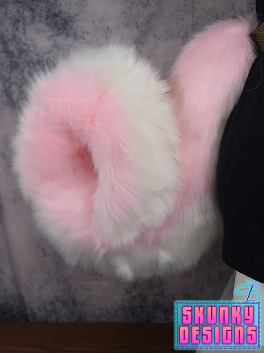 Pink and white husky tail