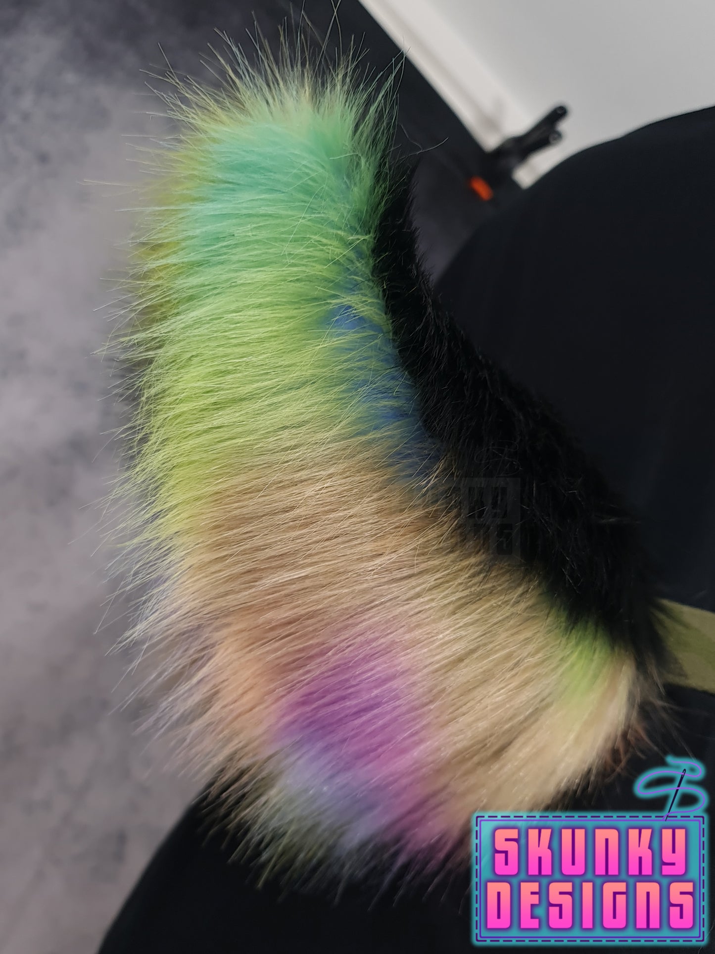 Black and pastel rainbow deer tail