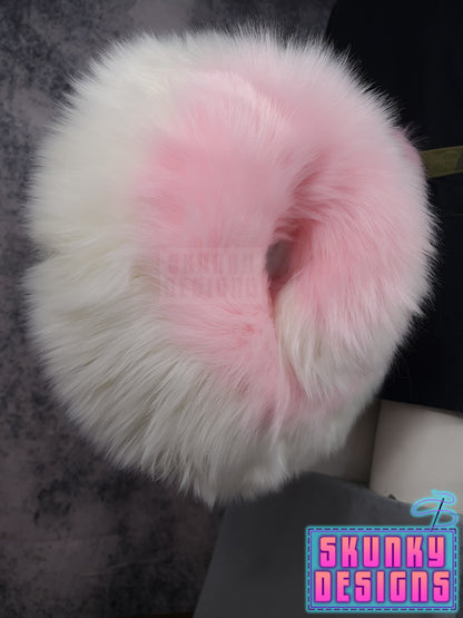 Pink and white husky tail