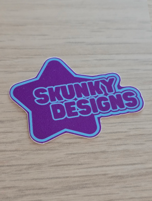 Skunky Designs Logo in Purple and Blue Sticker