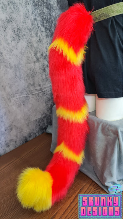 Feline tail - red with yellow v-wave pattern